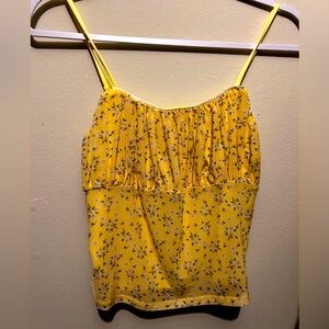 Yellow stamped with daisies top.